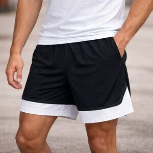 Under Armour Men's Elevated Mesh 5" Shorts in black, size XL